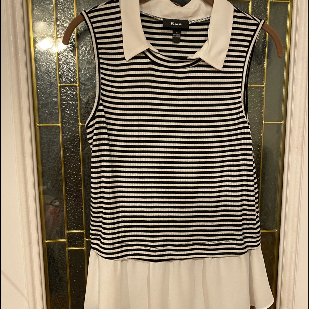 Sophisticated Max Studio women’s sleeveless top, black & white, w/ flouncy hem.